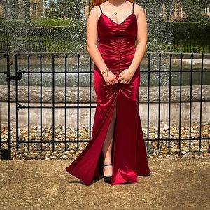 Long silk maroon mermaid style dress.